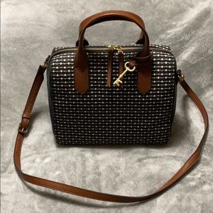 Black and white pattern with brown straps bag